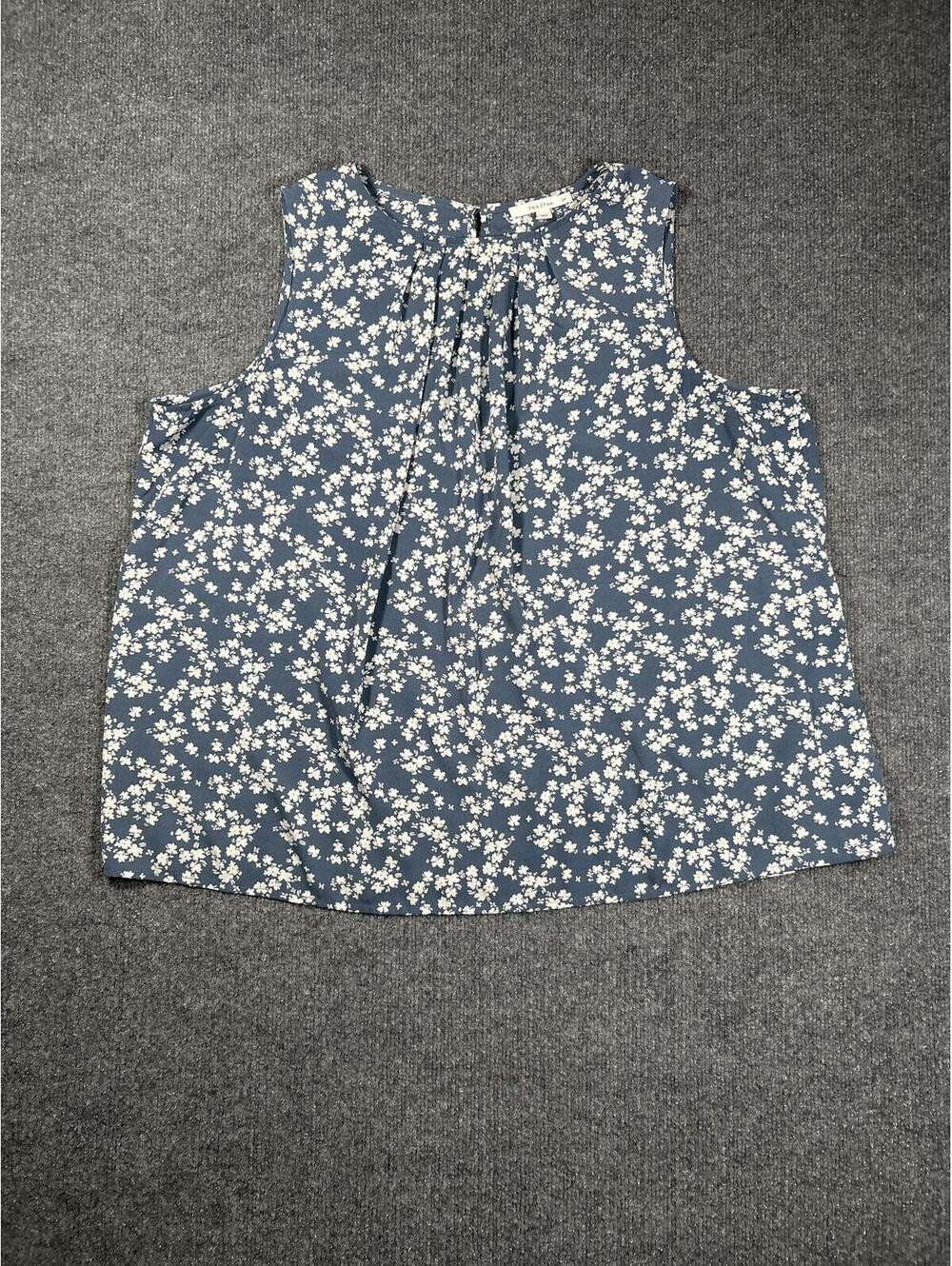 Sleeveless Blue Floral Top with White Flowers